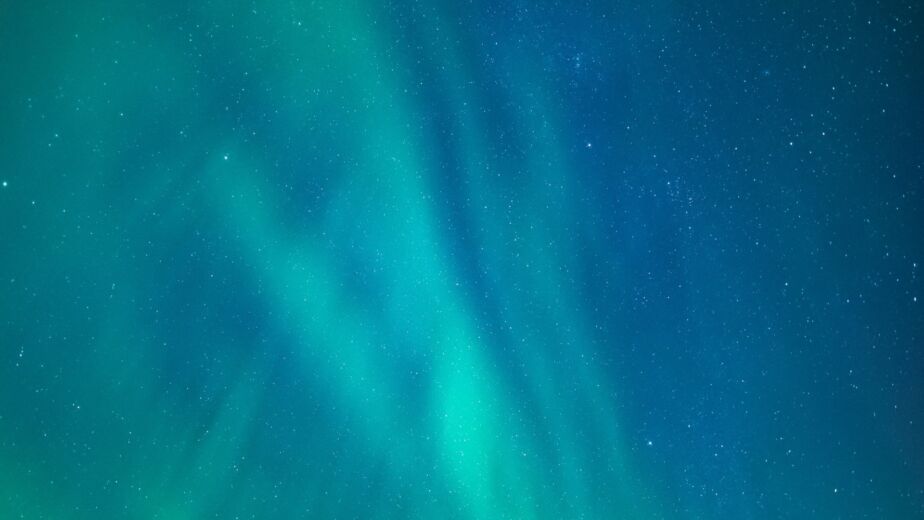 aurora-borealis-background-over-the-sky-of-iceland-2024-12-03-10-40-41-utc (1)-min