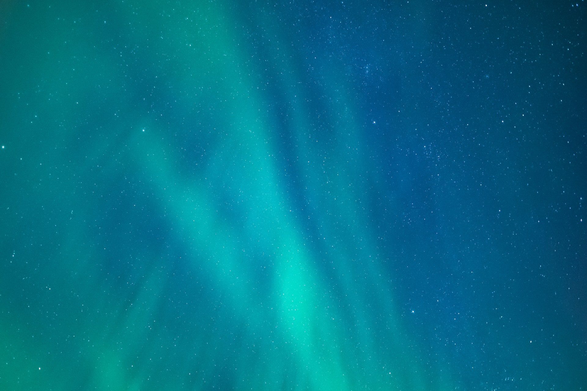 aurora-borealis-background-over-the-sky-of-iceland-2024-12-03-10-40-41-utc (1)-min